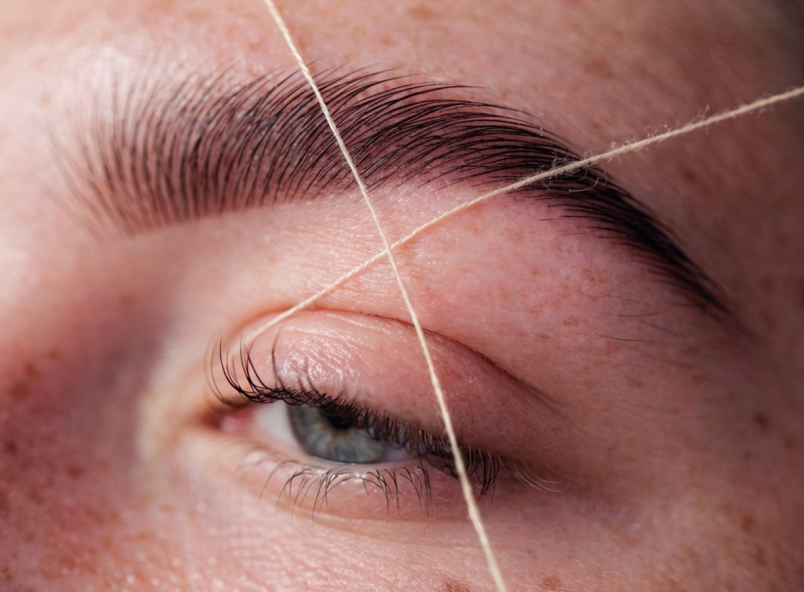 Eyebrow threading with cotton thread